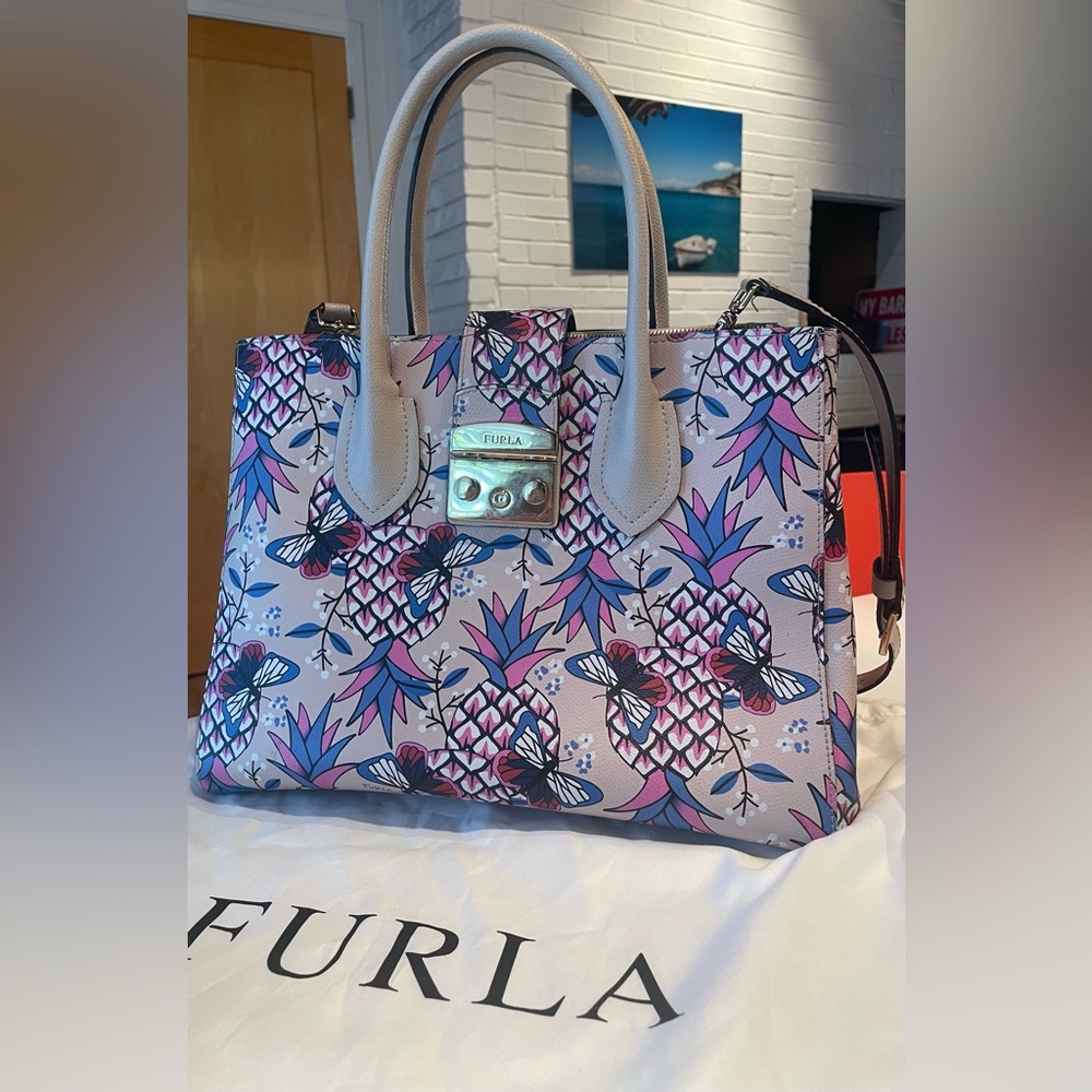 Furla genuine leather floral print women’s top handle bag with removable strap.